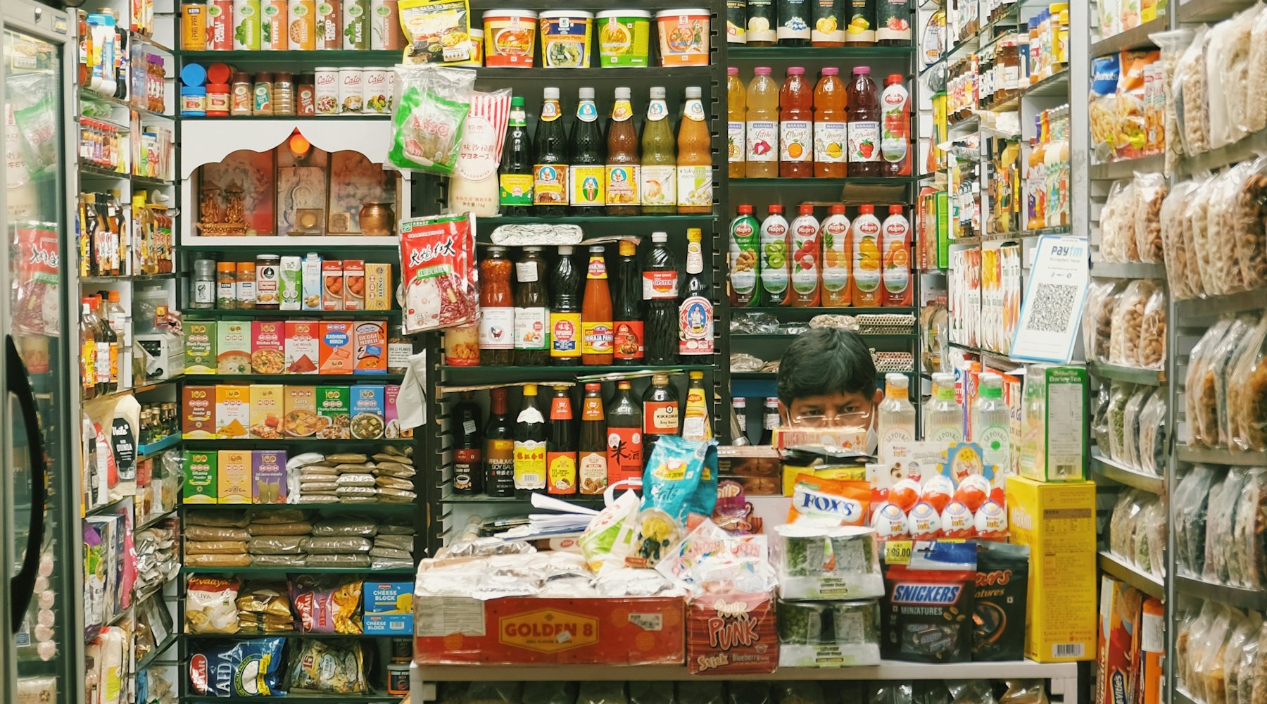Packaged world food products on a retail shelf